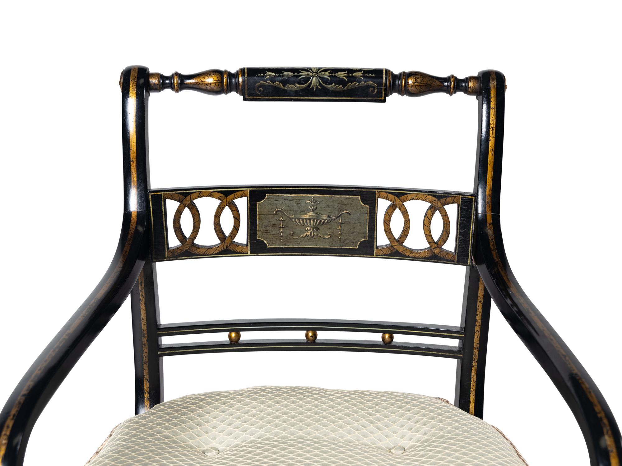 A Set of Four Regency Style Painted and Parcel Gilt Armchairs
