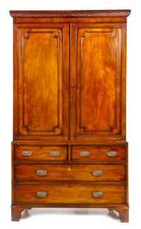 A George III Mahogany Linen Press Height 86 1/2 x width 47 3/4 x depth 20 3/8 inches. — EARLY 19TH CENTURY, THE CORNICE LATER