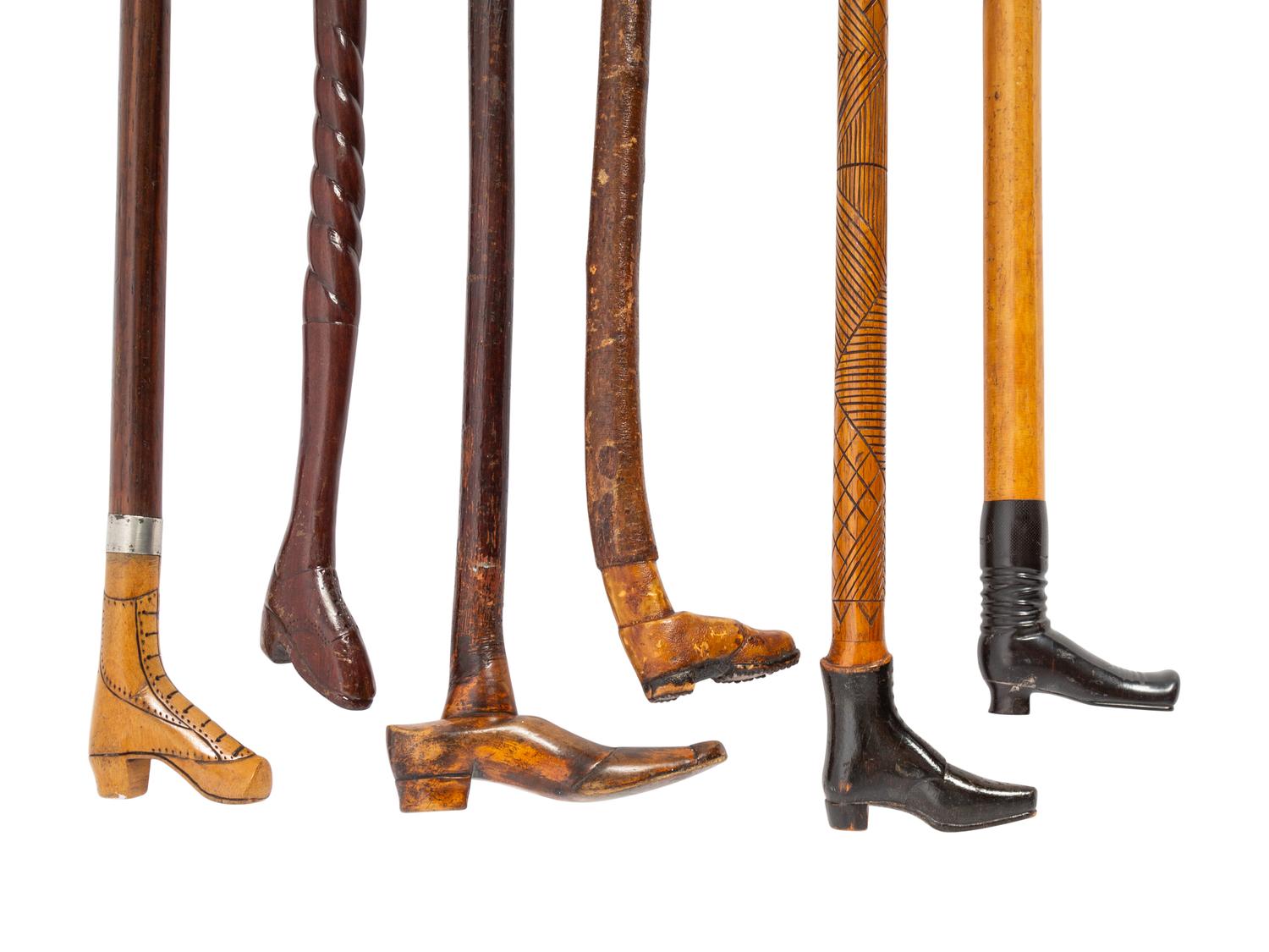 A Group of Folk Art Carved Shoe-Form Canes