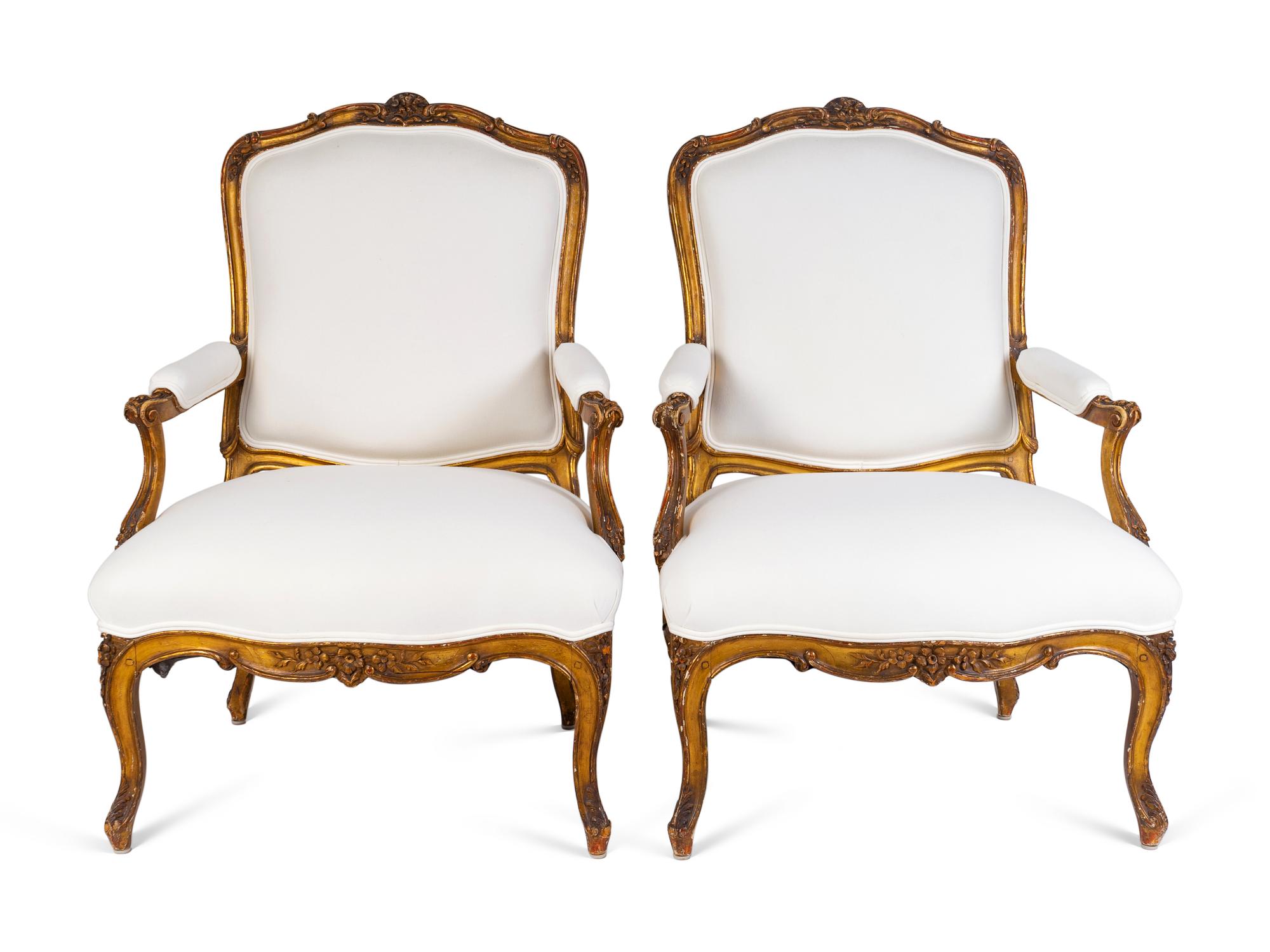 A Pair of Louis XV Giltwood Bergeres — LATE 18TH CENTURY