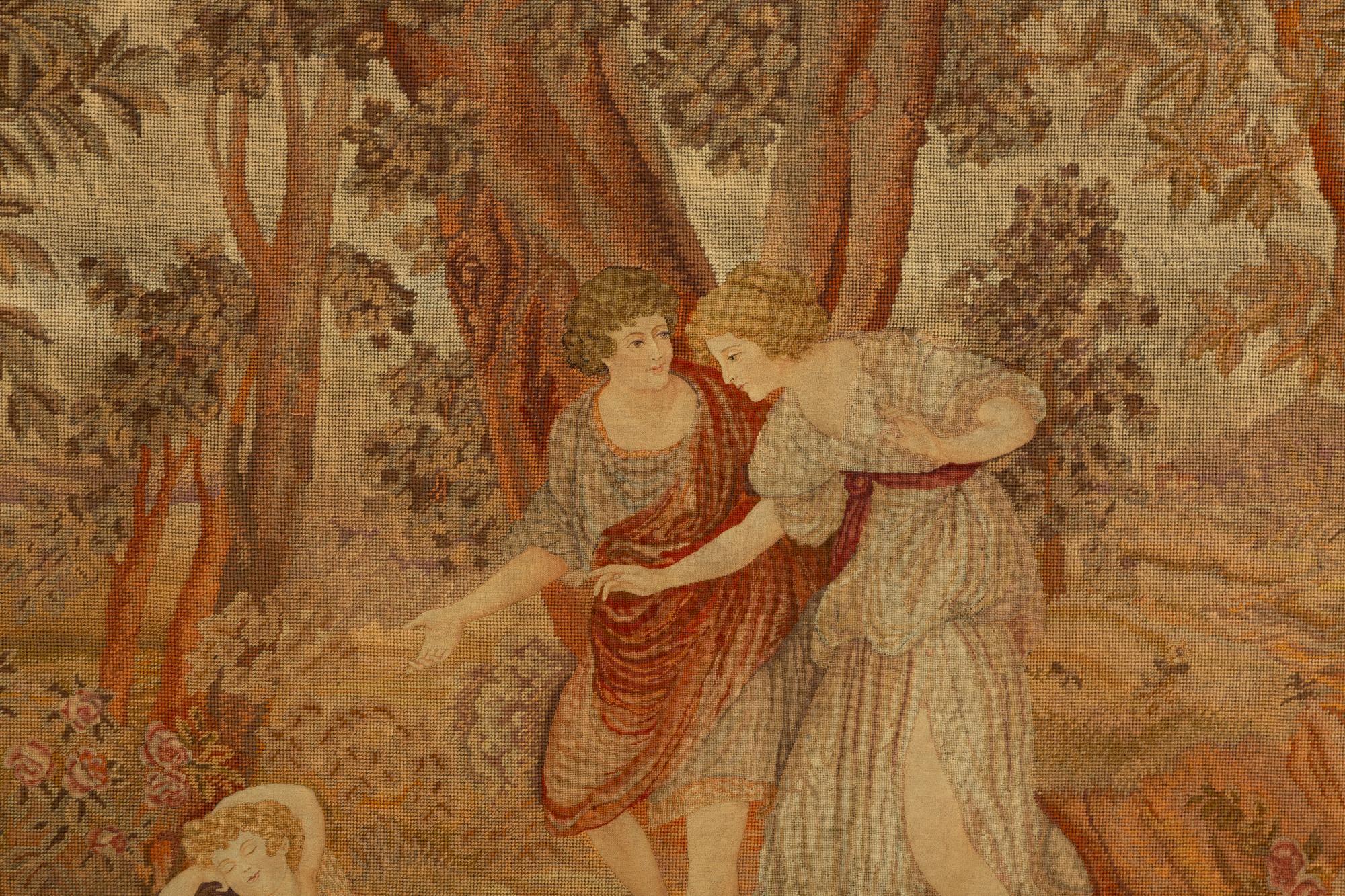 A Tapestry Panel Depicting a Couple Observing a Sleeping Putto