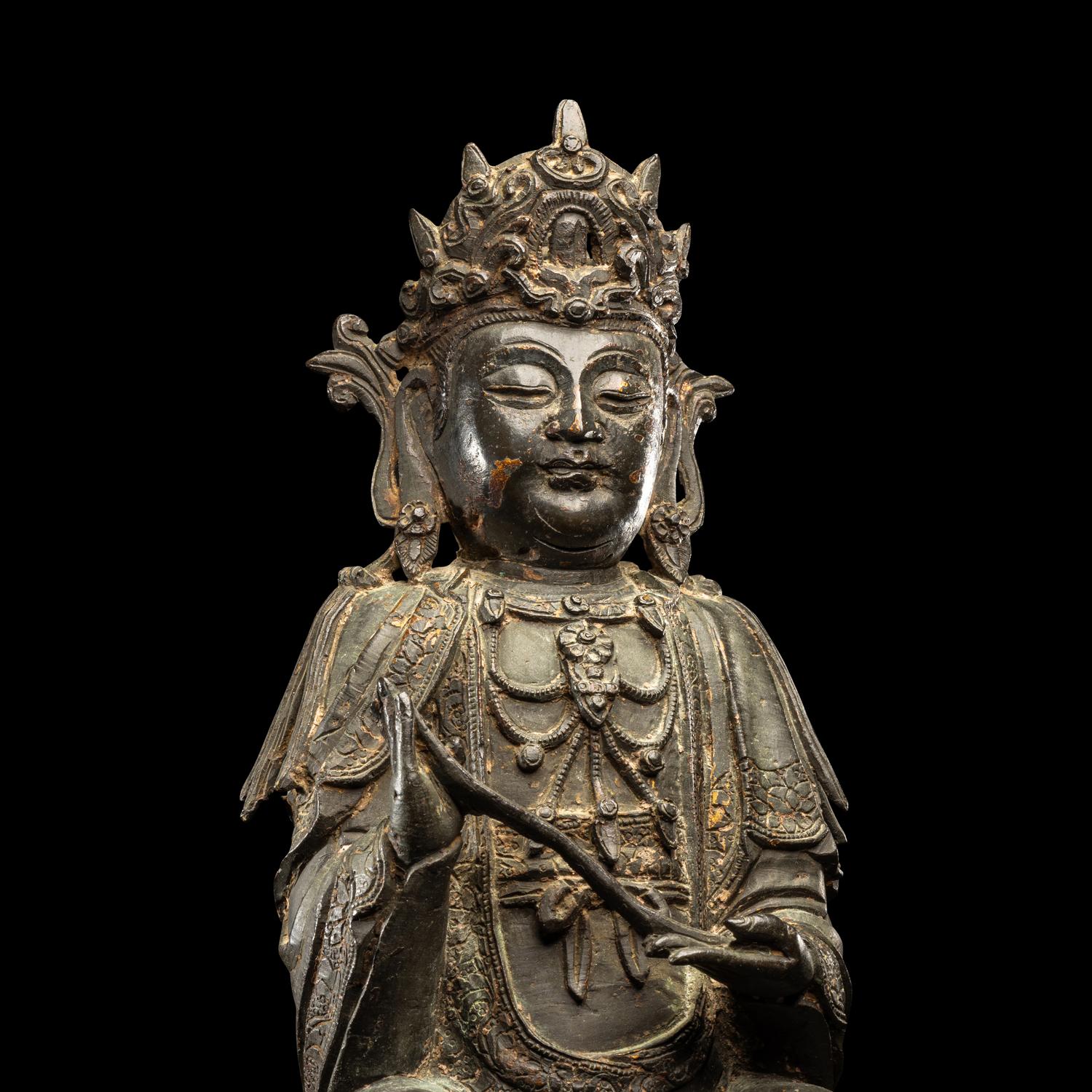 A Chinese Parcel-Gilt Bronze Figure of Guanyin, Ming Dynasty 明 銅局部鎏金觀音坐像