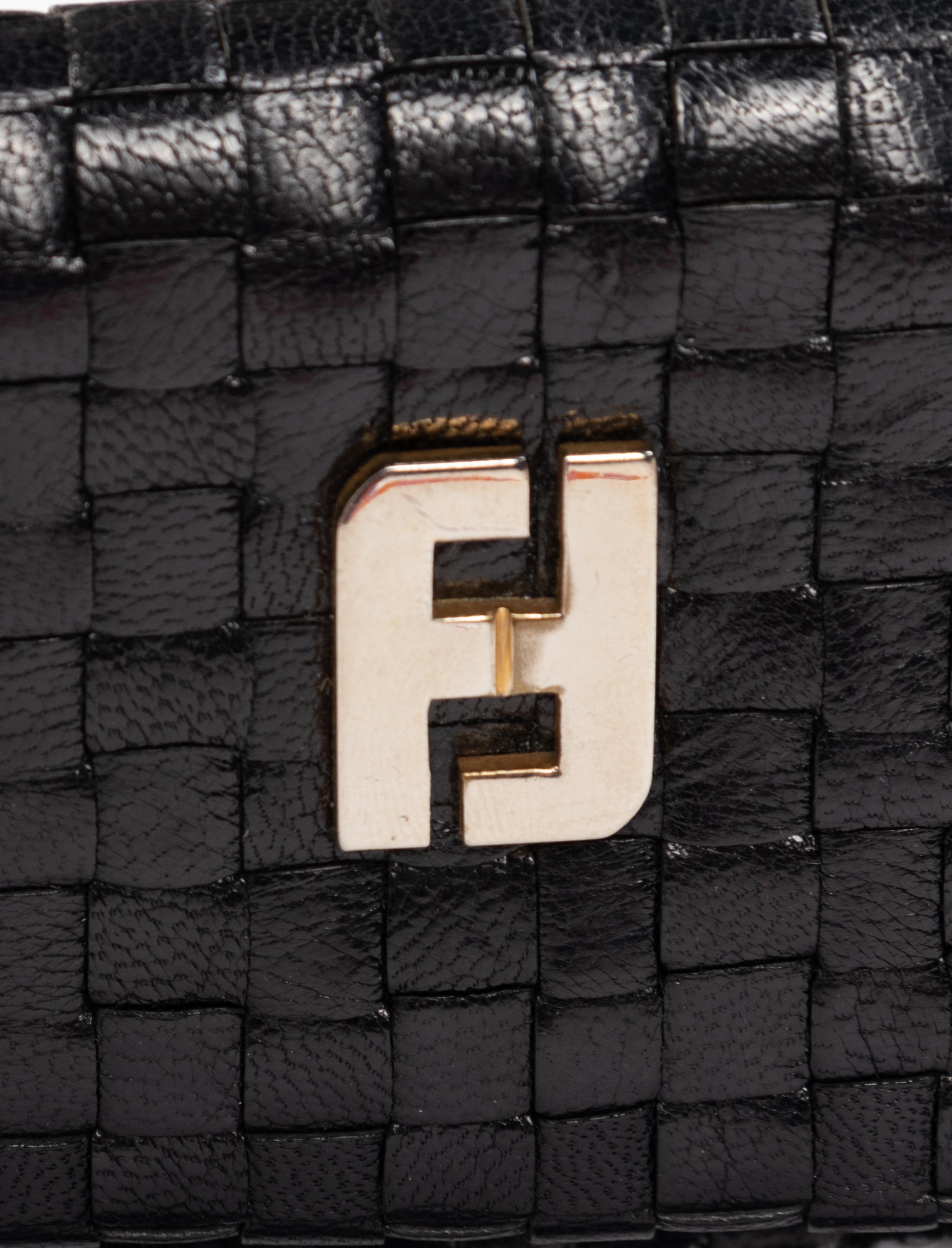Four Woven Leather Handbags: Two Bottega Veneta, One Fendi, and One De Vecchi, 1980s