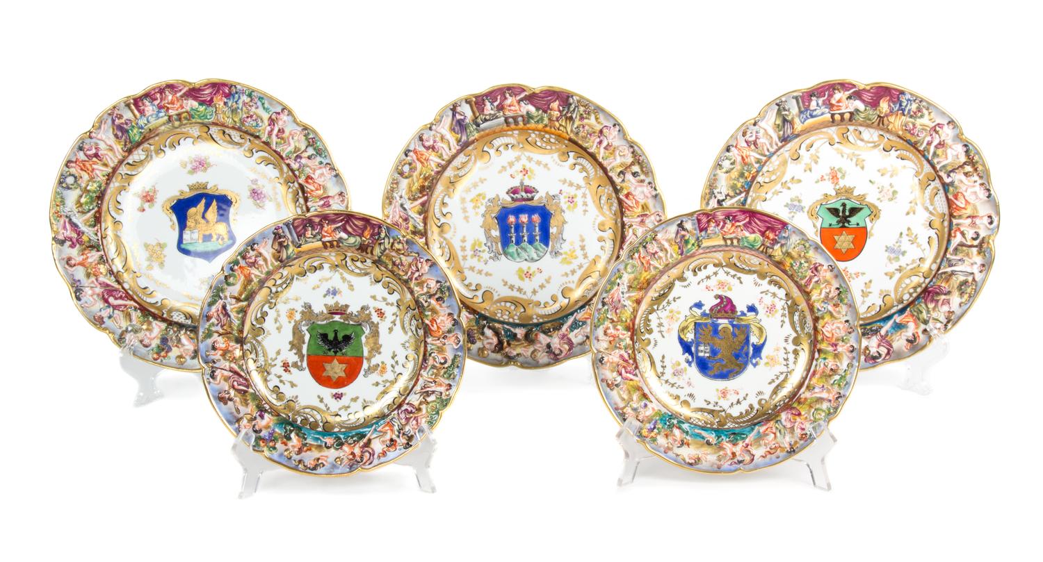 A Collection of Twenty-Seven Capo-di-Monte Porcelain Armorial Plates Diameter of first 10 1/2 inches. — 19TH CENTURY