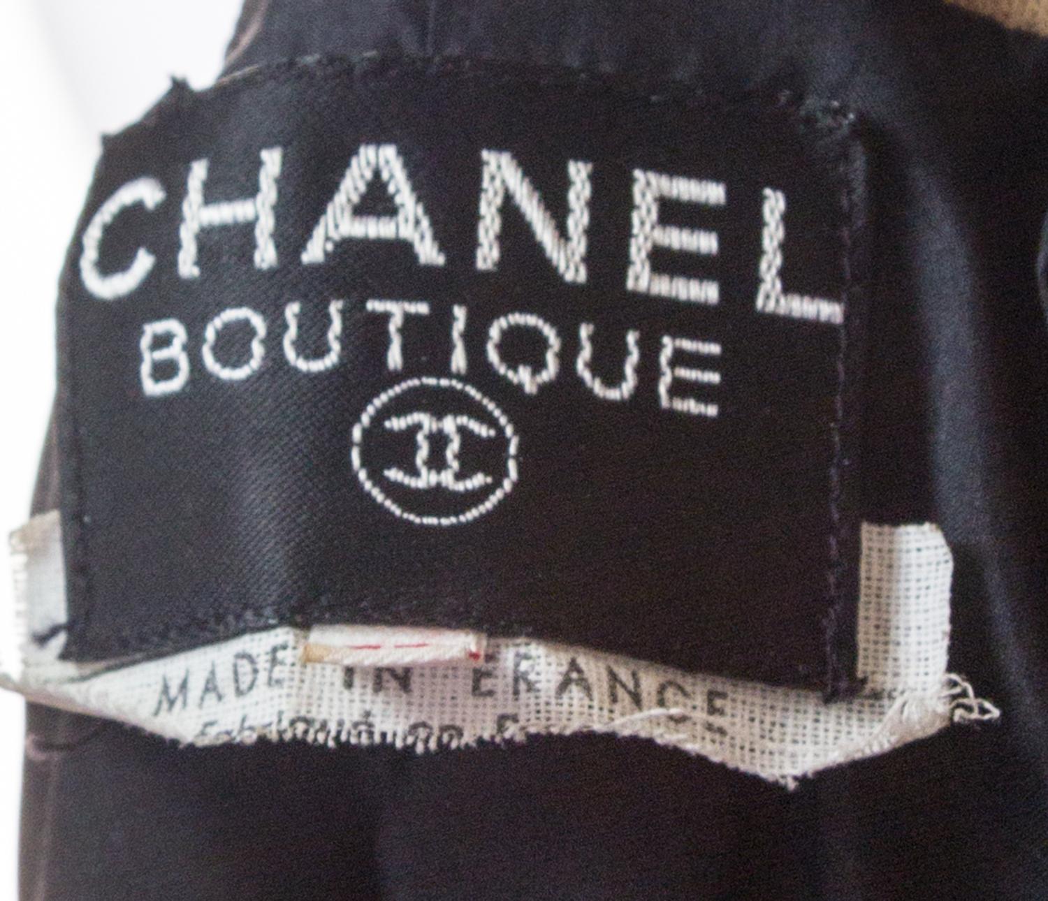 A Chanel Black Boucle Coat, Size 42.