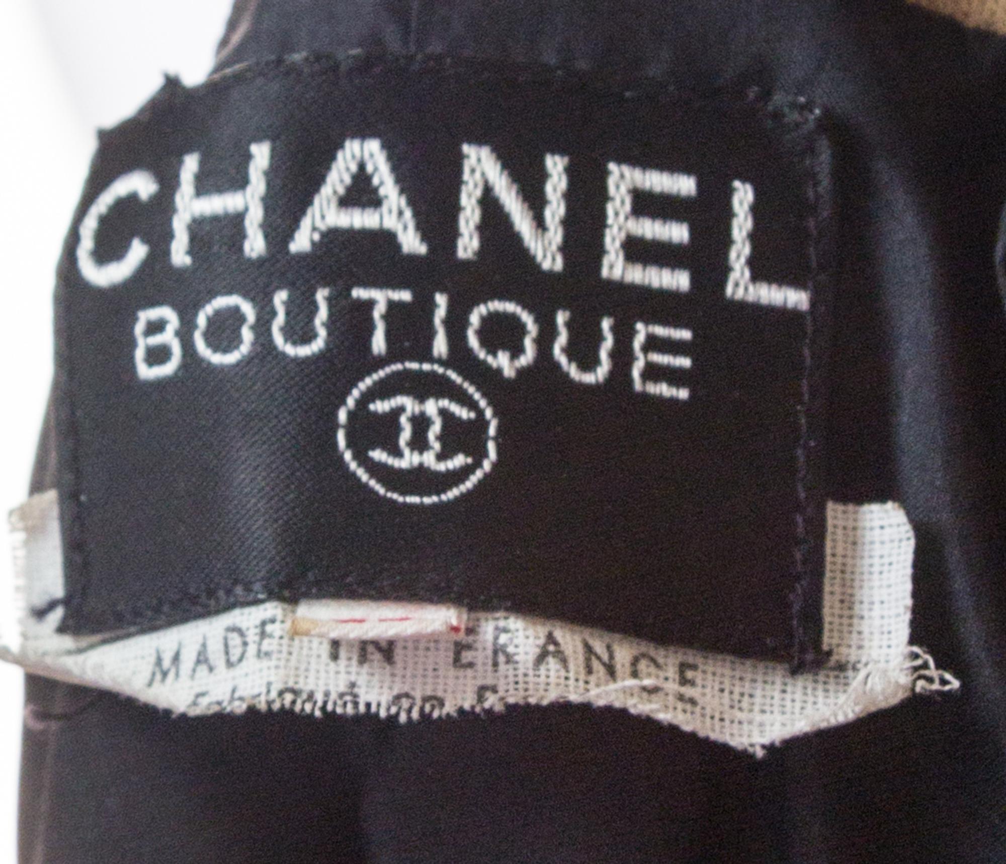 A Chanel Black Boucle Coat, Size 42.