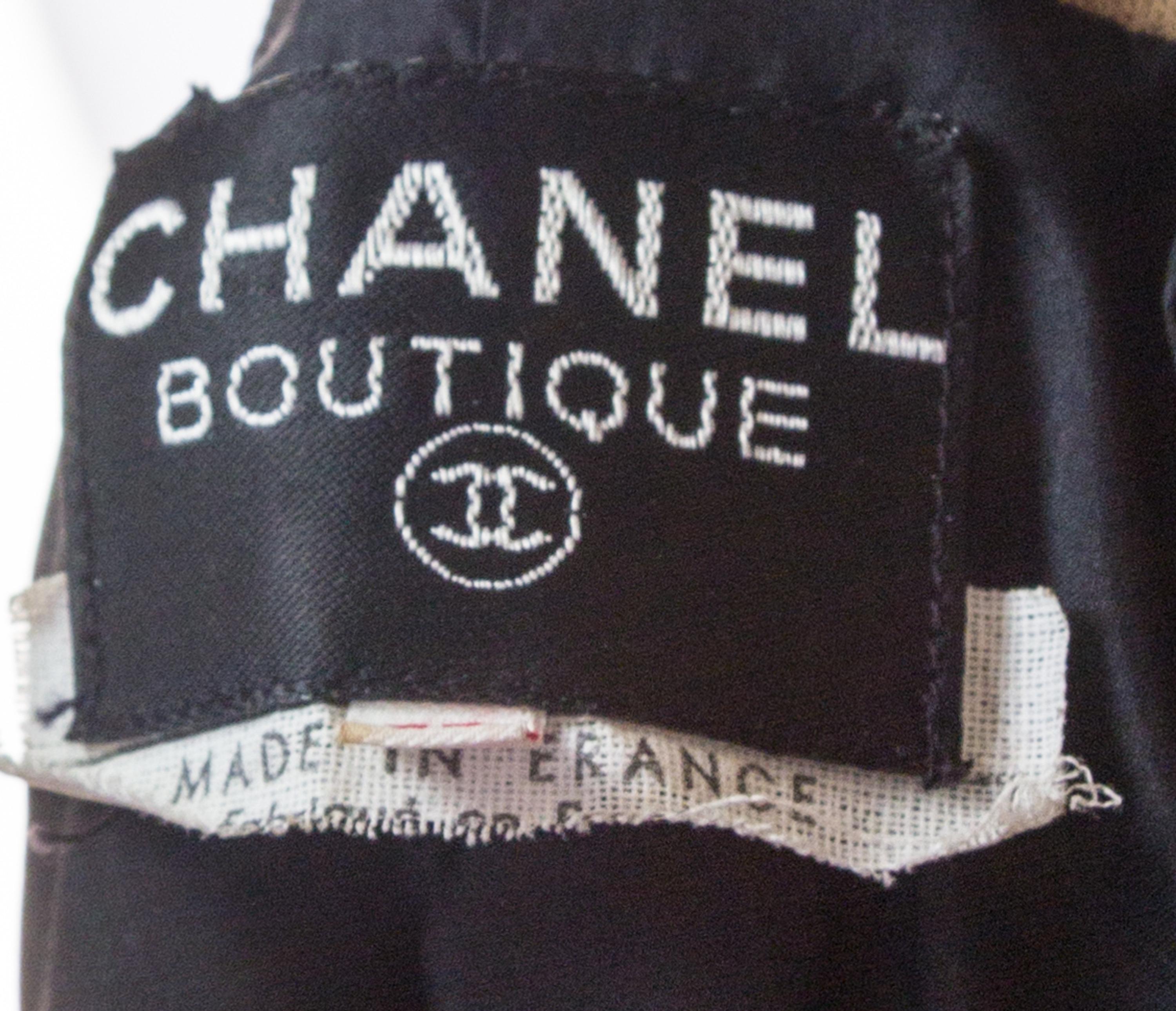 A Chanel Black Boucle Coat, Size 42.