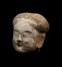 A Chinese Pottery Head of an Attendant