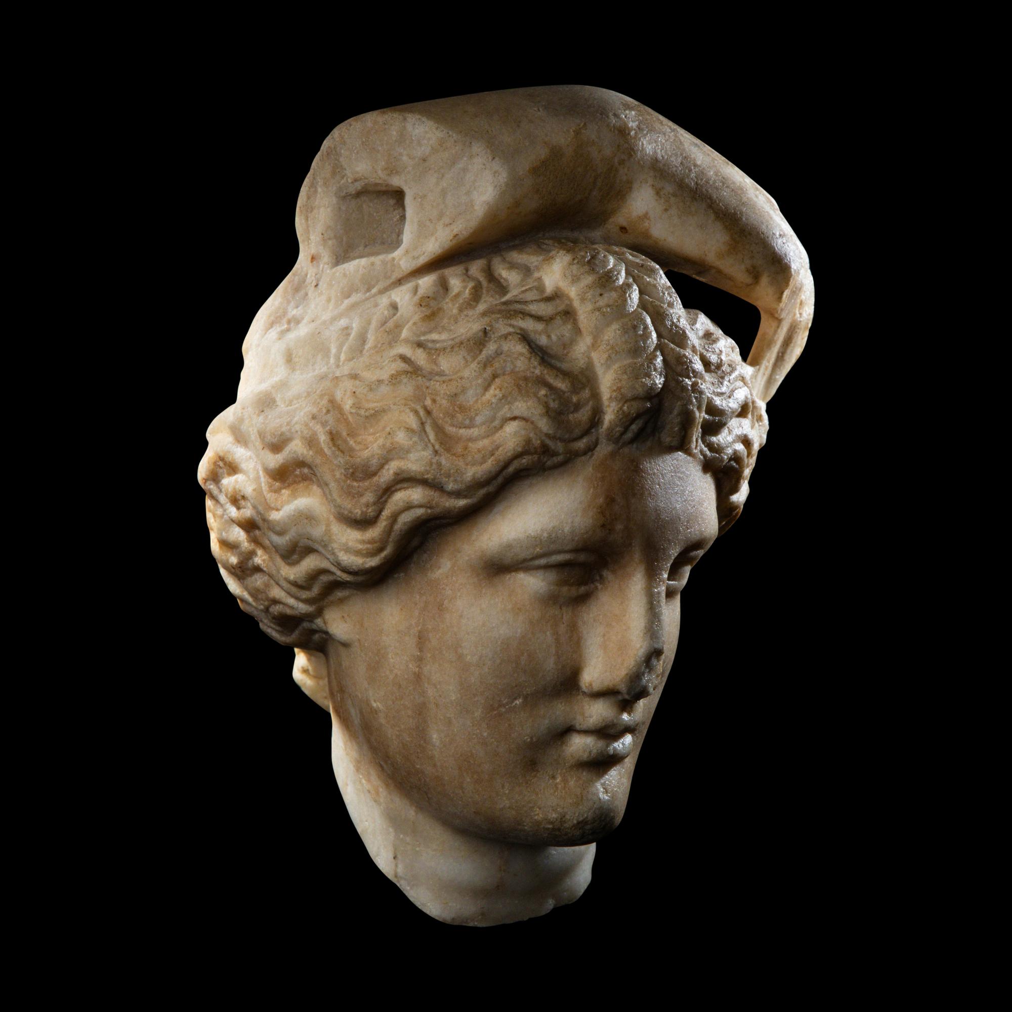 A Roman Marble Head of Apollo Lykeios