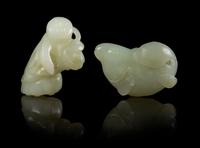 Two Carved Jade Toggles Length of first 2 inches.