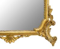 A Louis XV Style Carved Giltwood Mirror