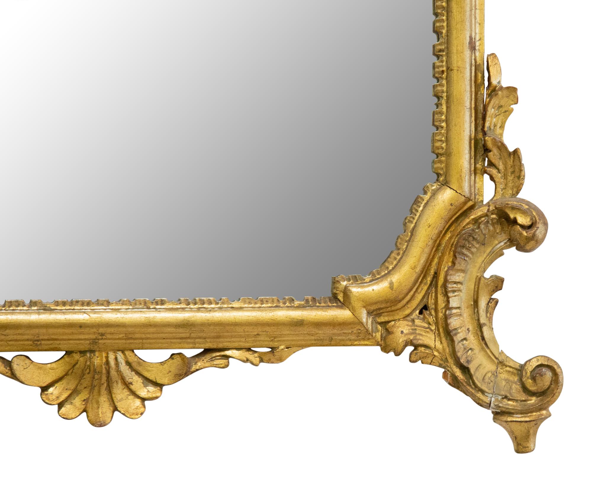 A Louis XV Style Carved Giltwood Mirror