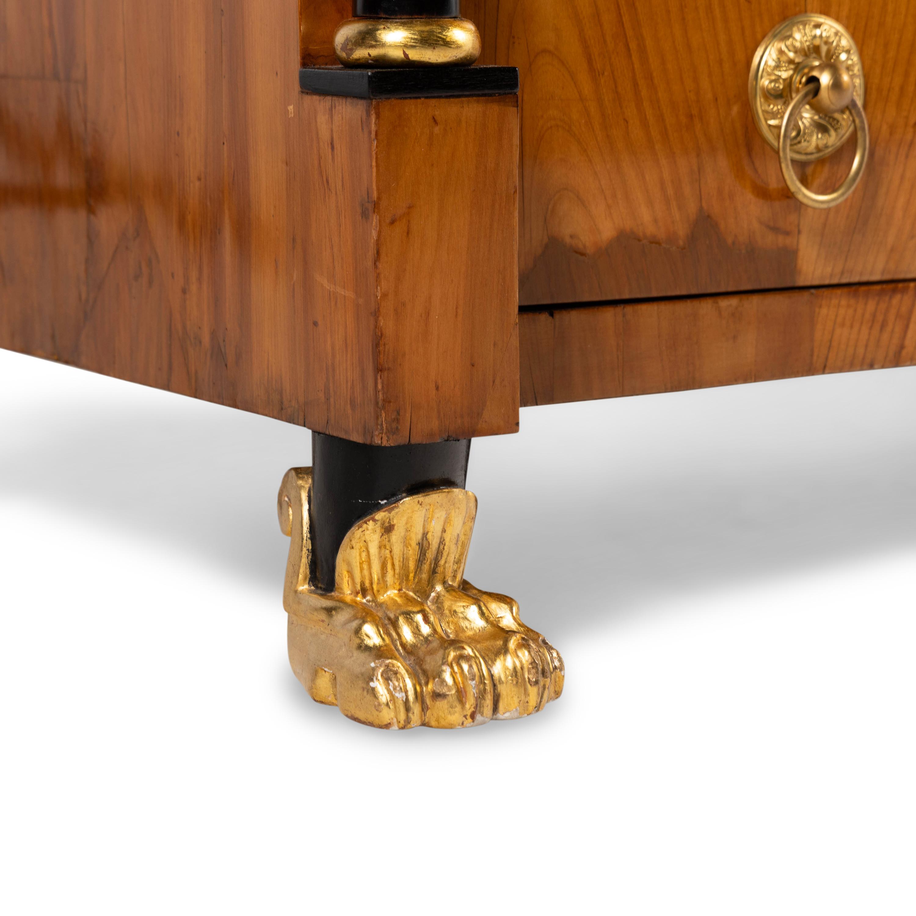 An Austrian Neoclassical Parcel Gilt and Ebonized Ash Commode