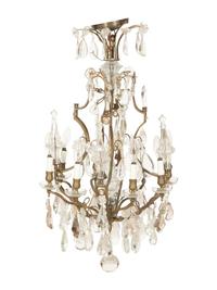 A Louis XV Style Gilt Bronze and Cut Glass Eight-Light Chandelier
