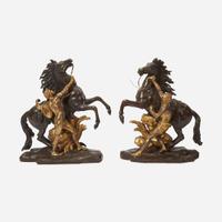 After Guillaume Coustou (French, 1677-1746) A Pair of Gilt and Patinated Bronze Models of the Marly Horses, 19th century