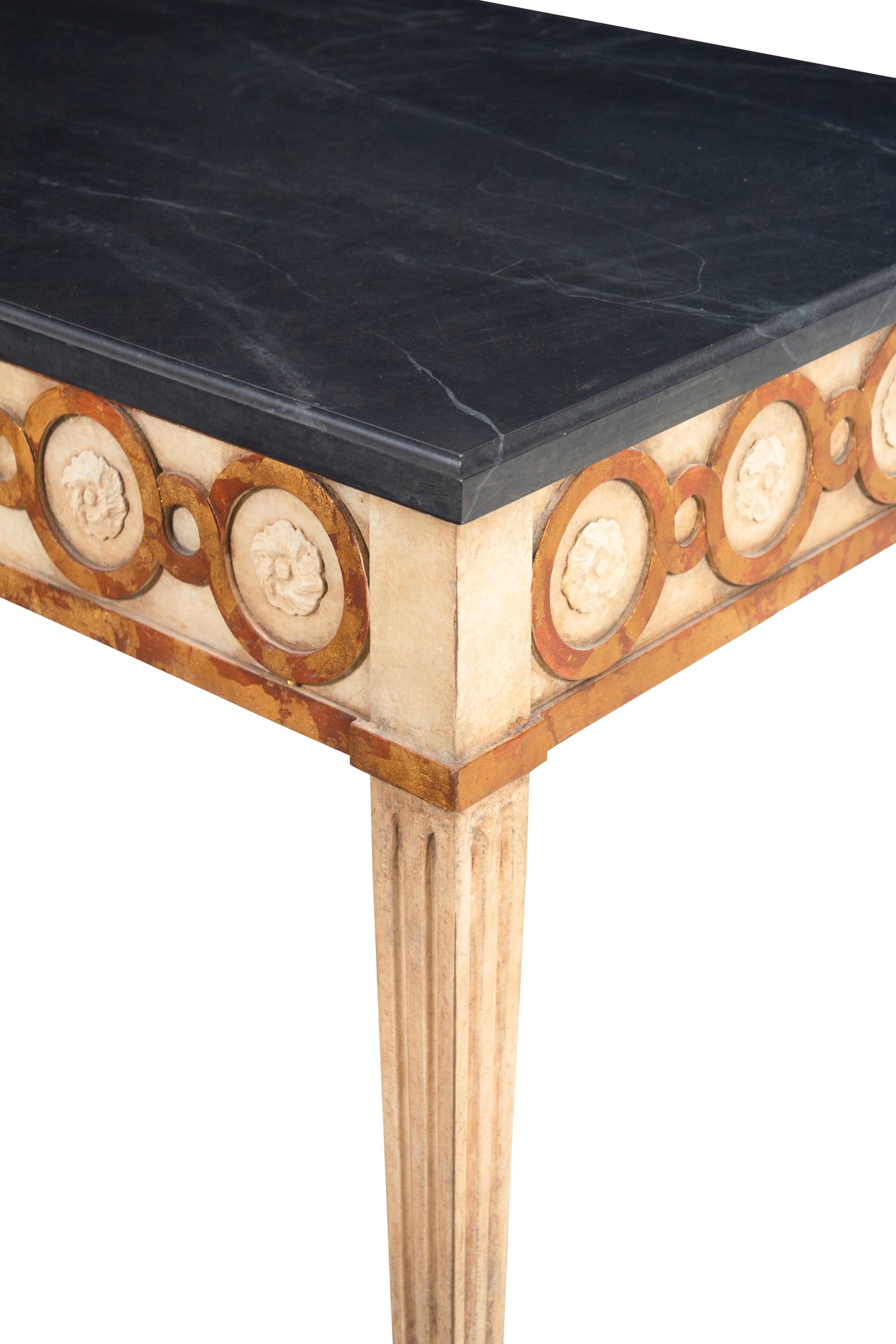 A Pair of Painted and Parcel Gilt Console Tables