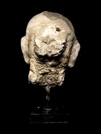 Four Gandharan Stucco Fragmented Heads