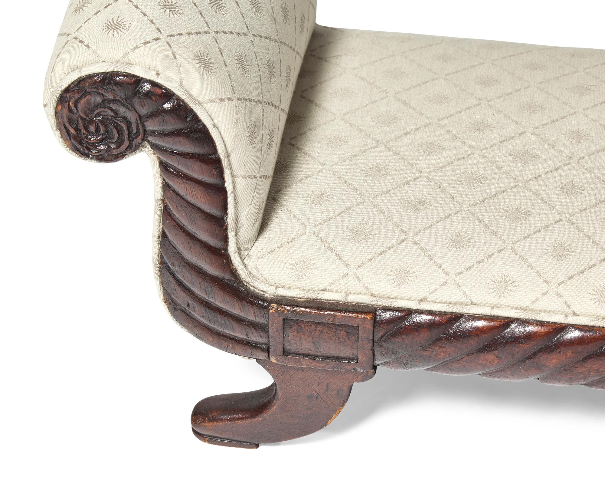 A Classical Carved Mahogany Footstool
