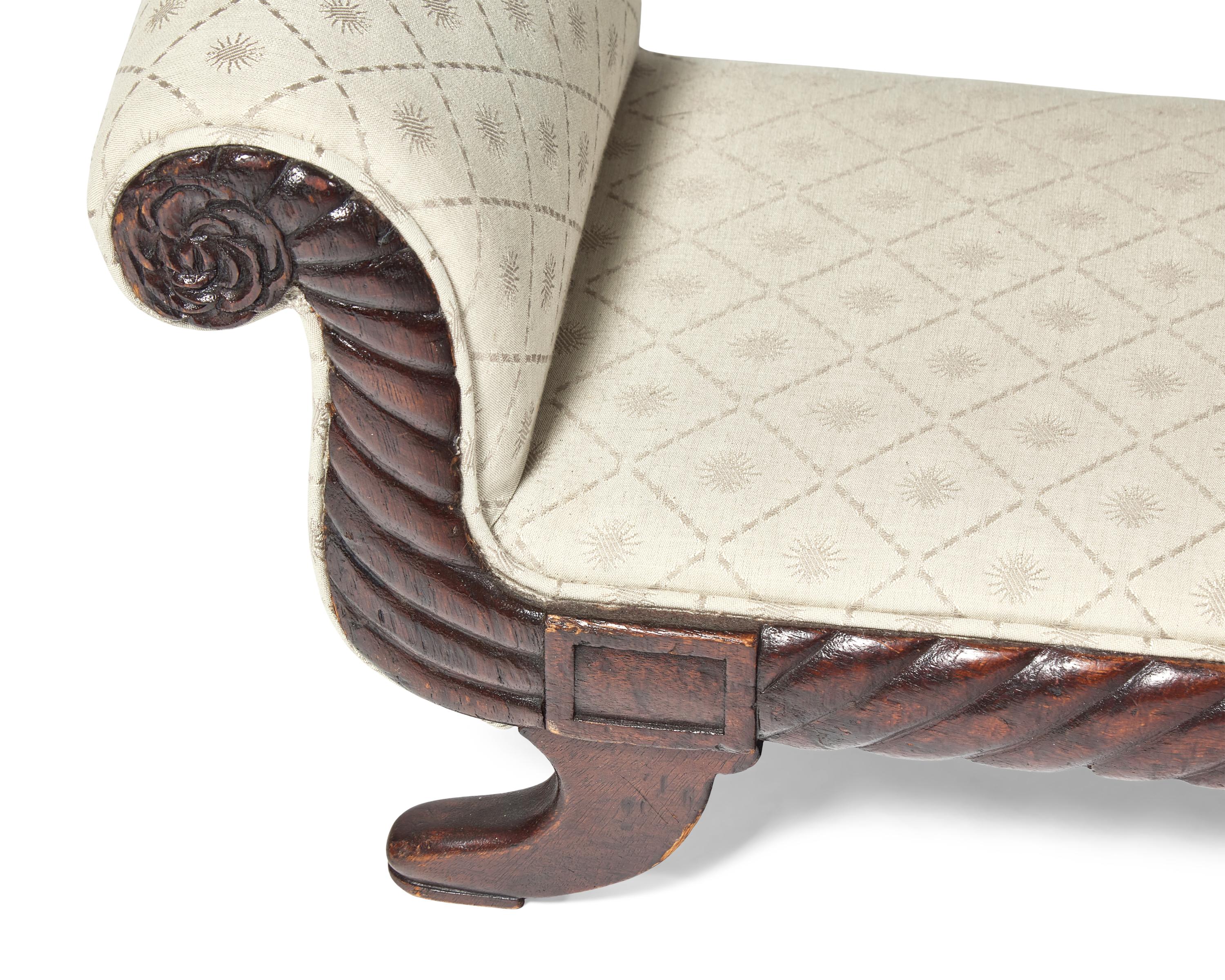 A Classical Carved Mahogany Footstool