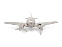A Large Silvered Metal Airplane-Form Table Top Smoking Set