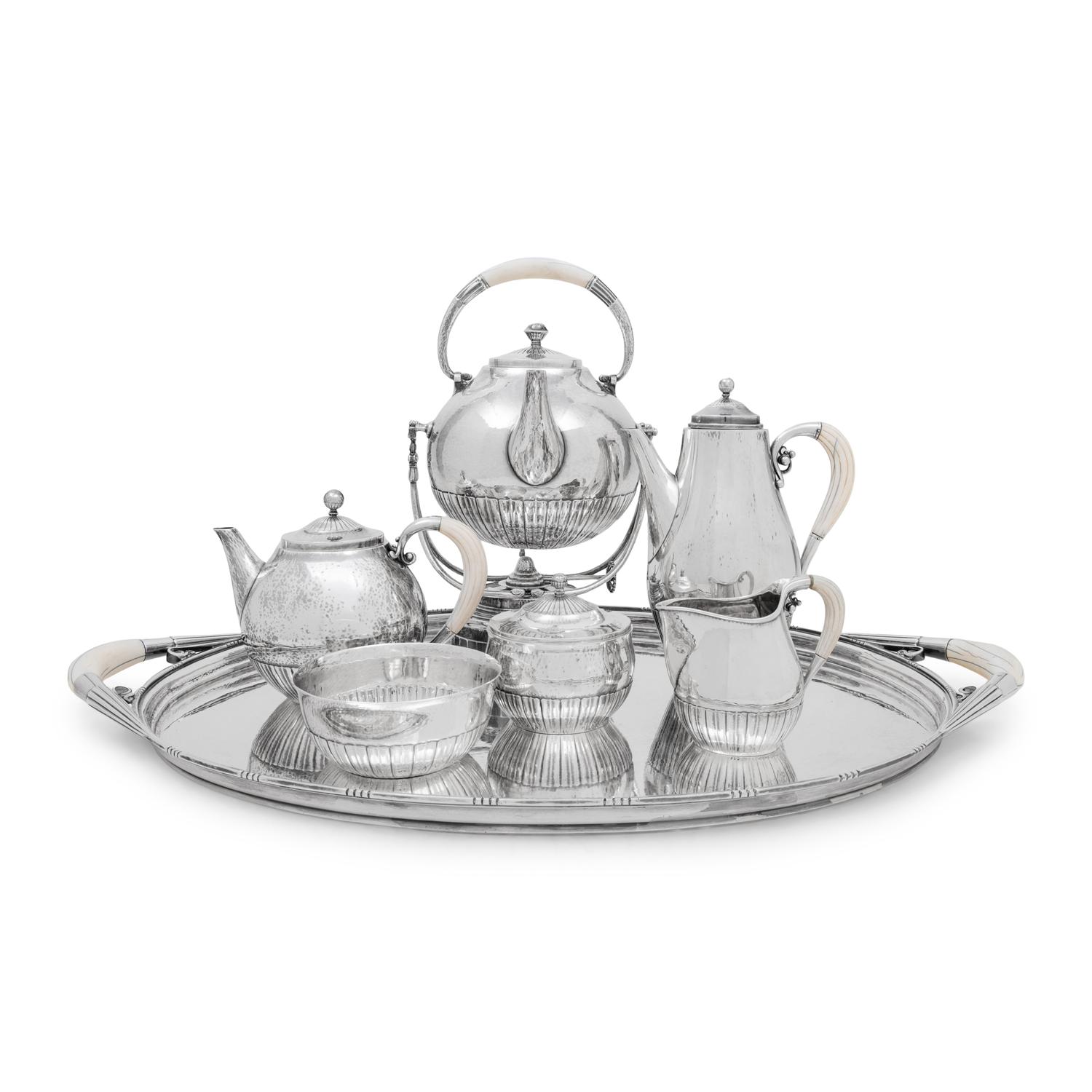 A Georg Jensen Cosmos Seven-Piece Silver Tea and Coffee Service