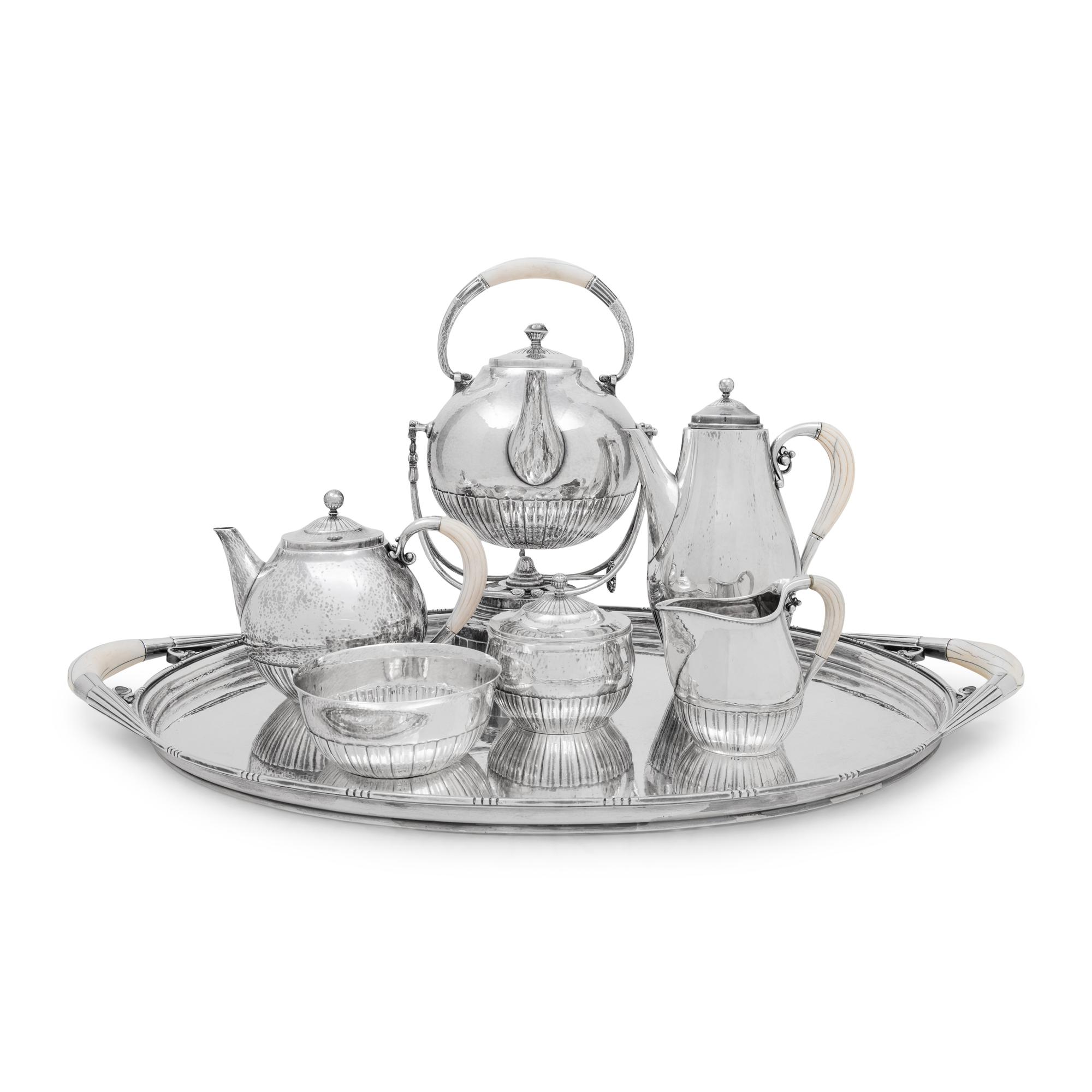 A Georg Jensen Cosmos Seven-Piece Silver Tea and Coffee Service