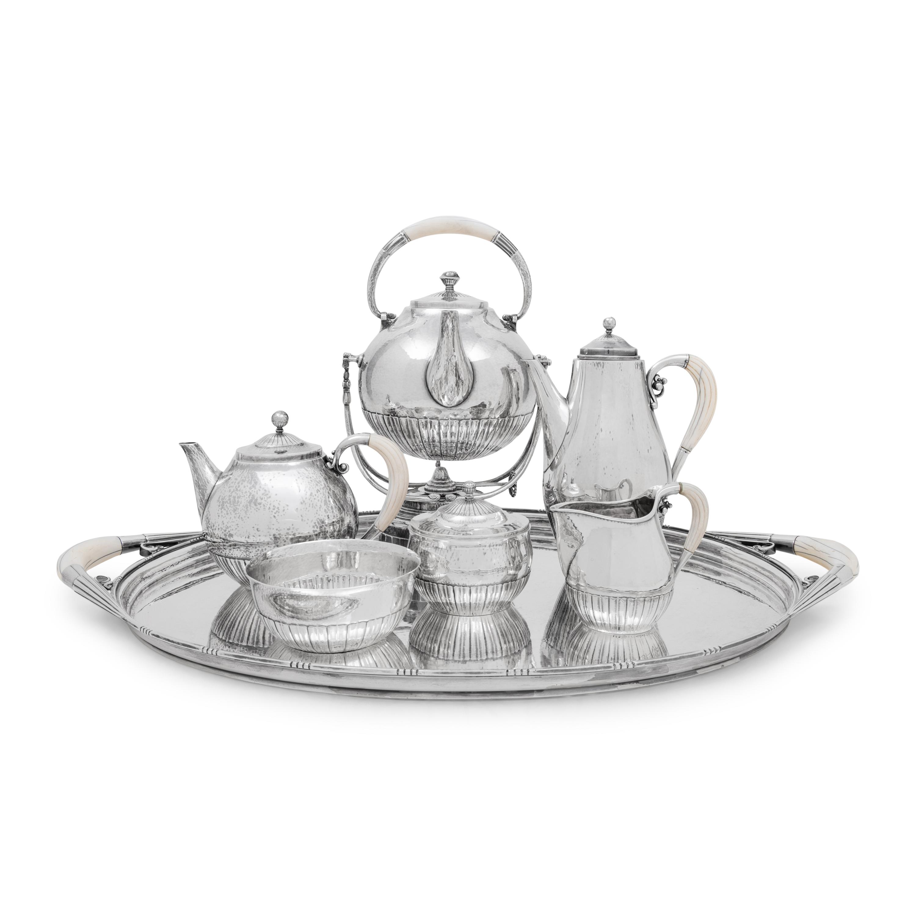 A Georg Jensen Cosmos Seven-Piece Silver Tea and Coffee Service