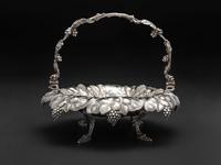 An American Repousse Silver Swing-Handle Basket