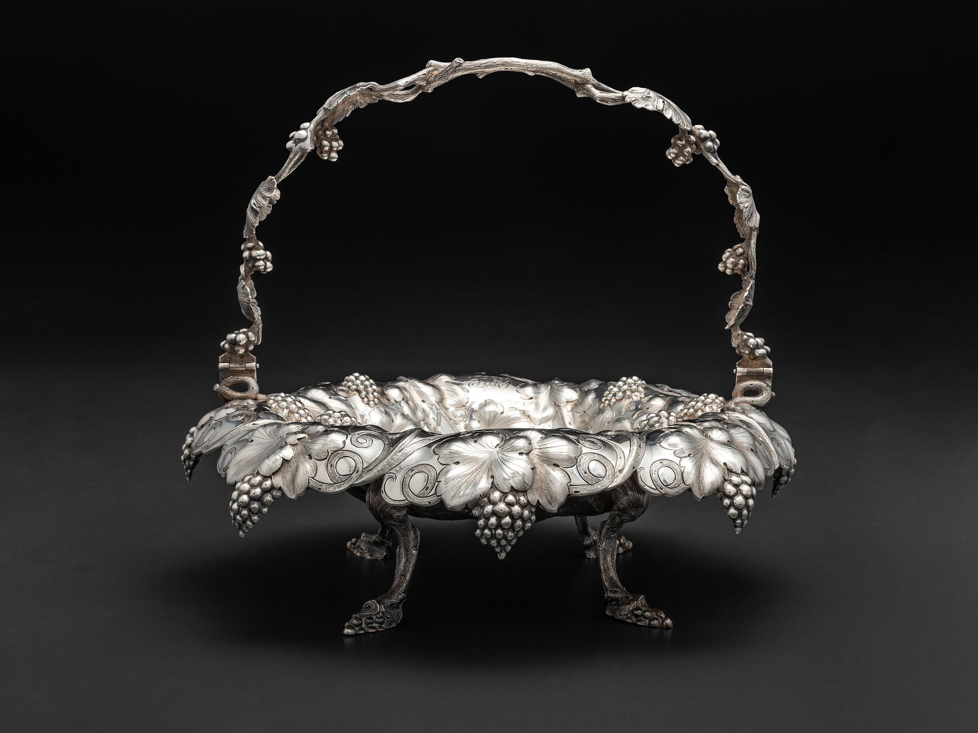 An American Repousse Silver Swing-Handle Basket