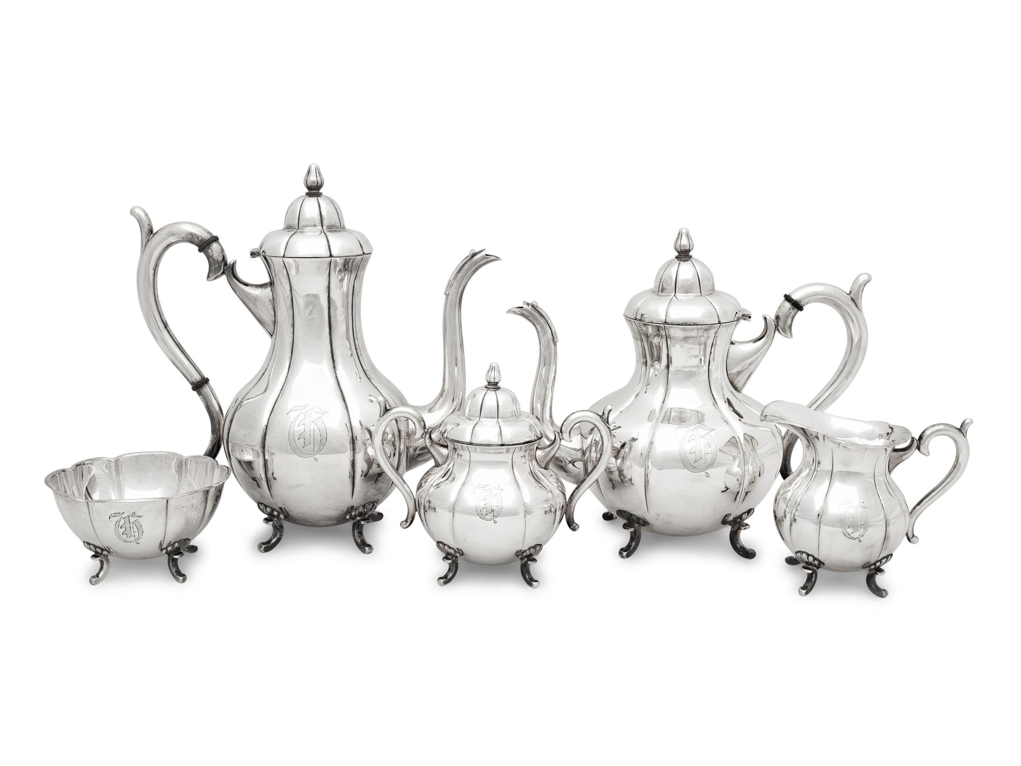 A Japanese Silver Five-Piece Tea and Coffee Service