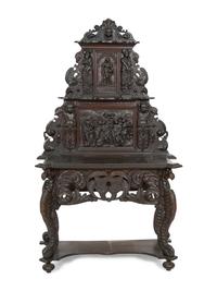 A Renaissance Revival Elaborately Carved Oak Stand