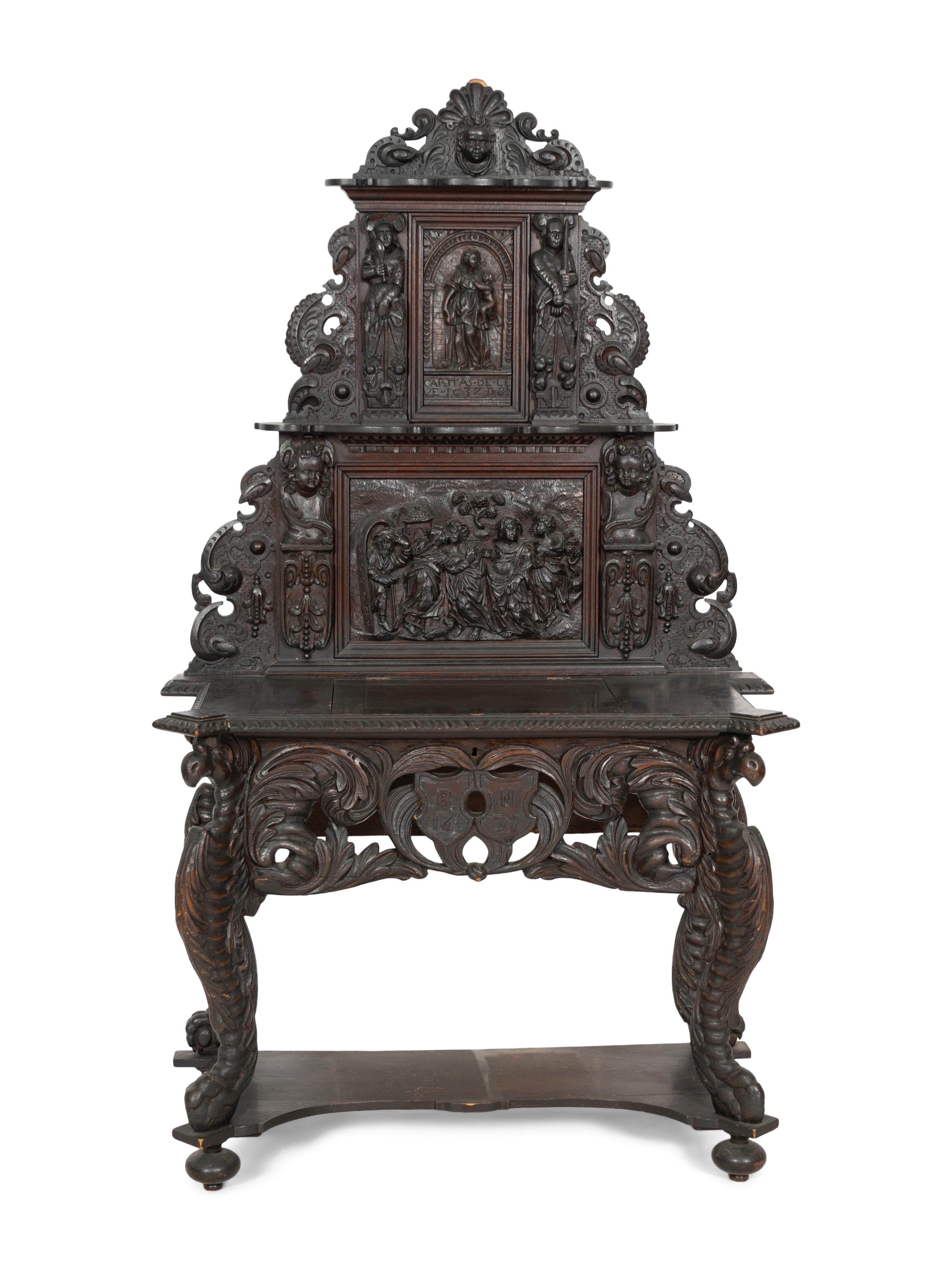 A Renaissance Revival Elaborately Carved Oak Stand