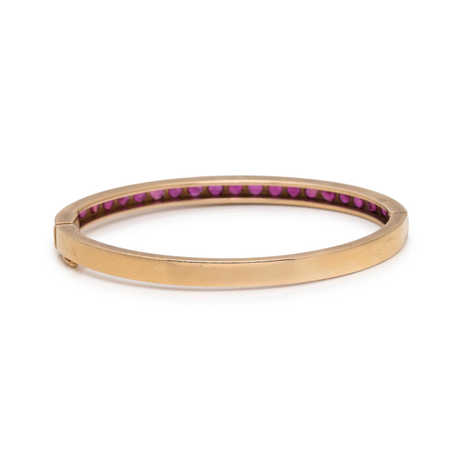 YELLOW GOLD AND SYNTHETIC RUBY BANGLE BRACELET