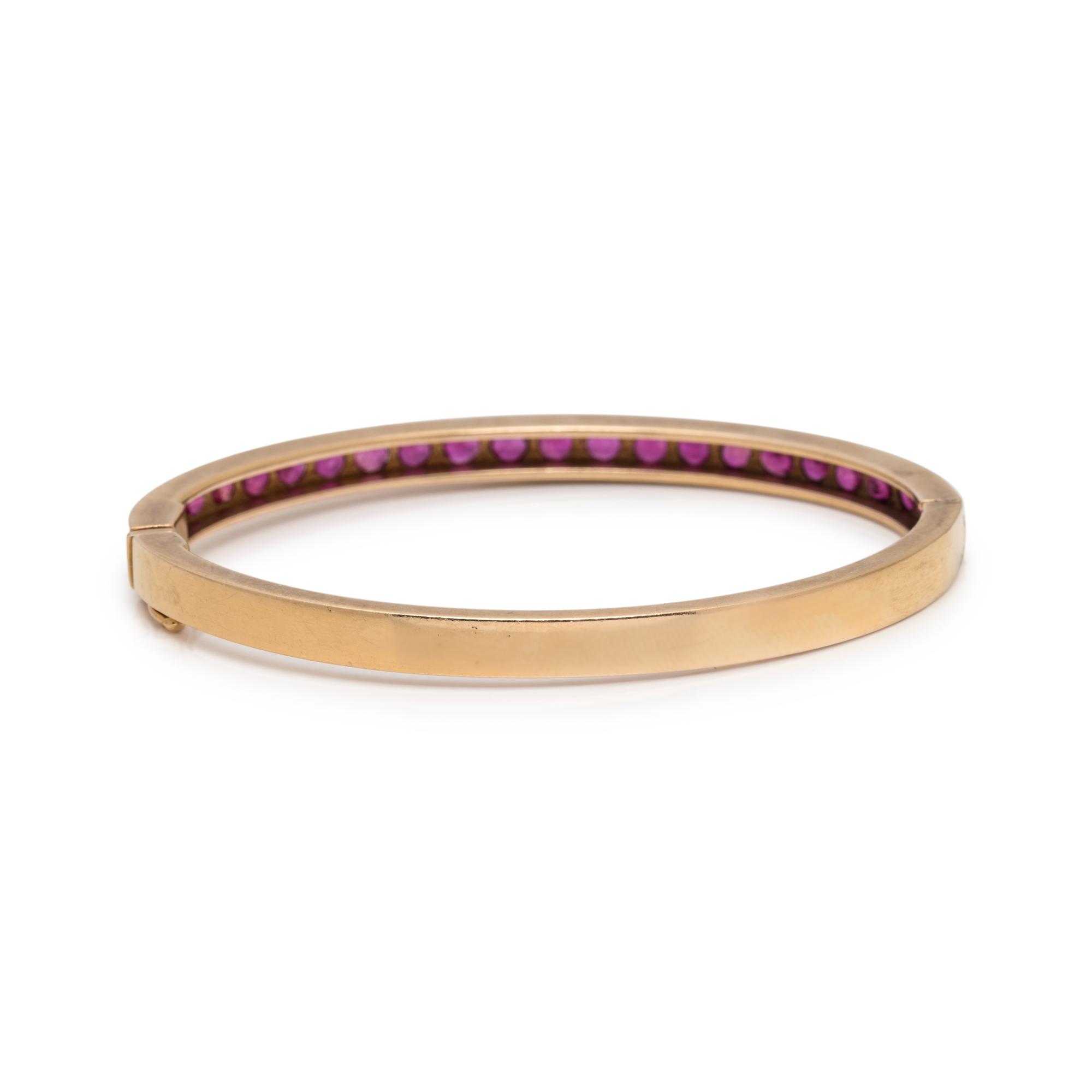 YELLOW GOLD AND SYNTHETIC RUBY BANGLE BRACELET