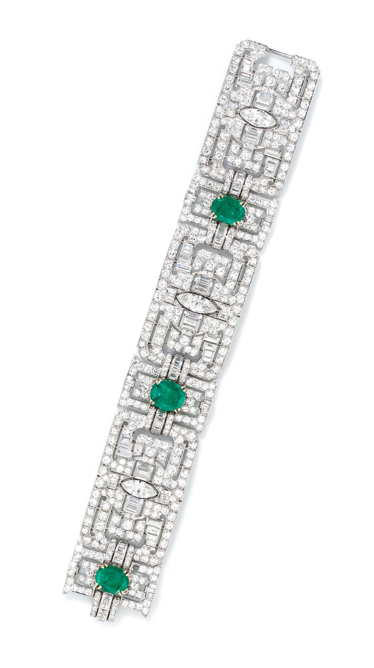 An Art Deco Platinum, Gold, Diamond and Emerald Bracelet, 60.40 dwts.