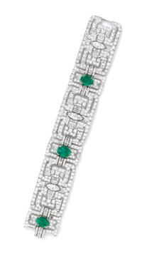 An Art Deco Platinum, Gold, Diamond and Emerald Bracelet, 60.40 dwts.