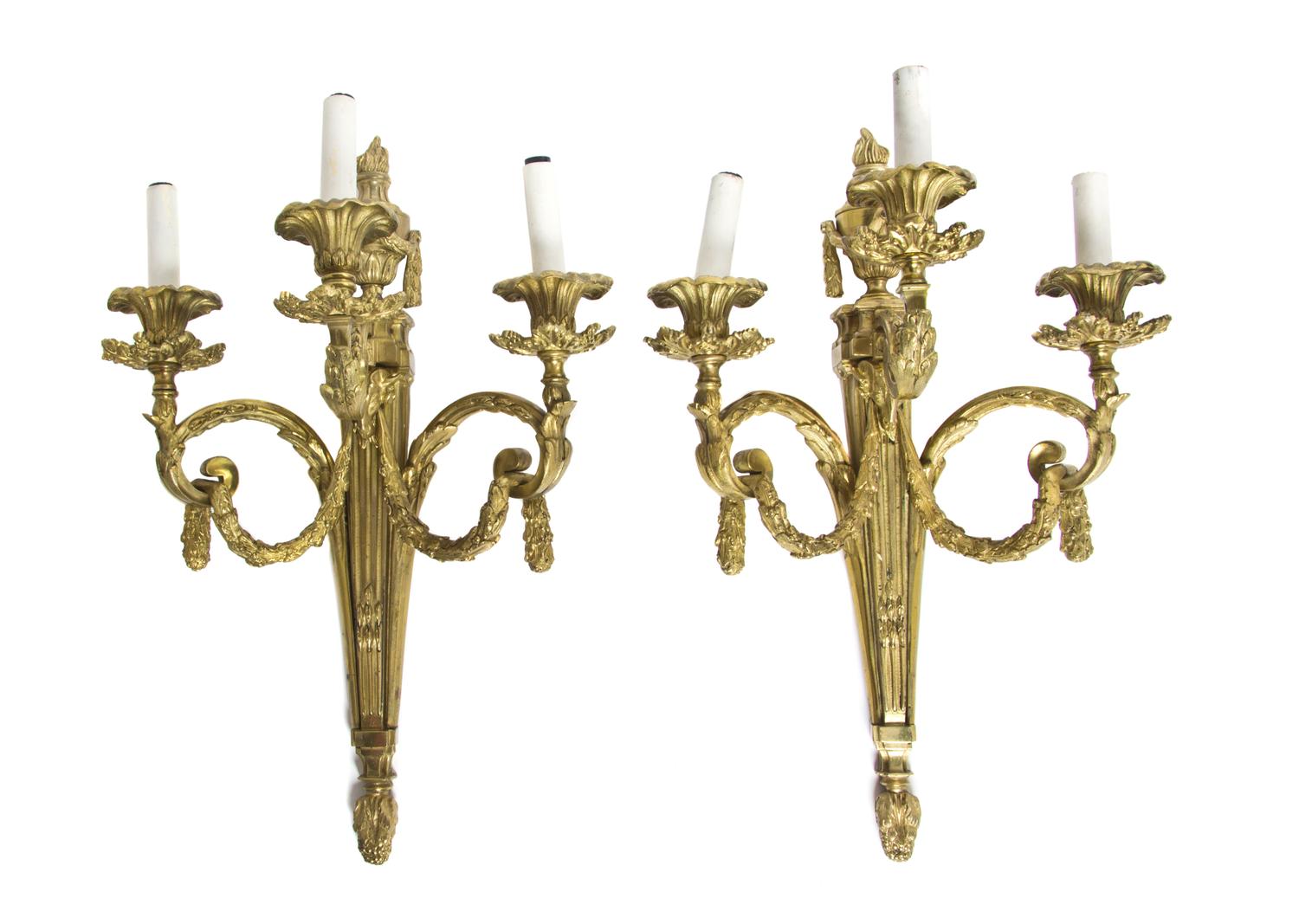 A Pair of Louis XVI Style Gilt Bronze Three-Light Sconces, Height 20 1/2 inches.