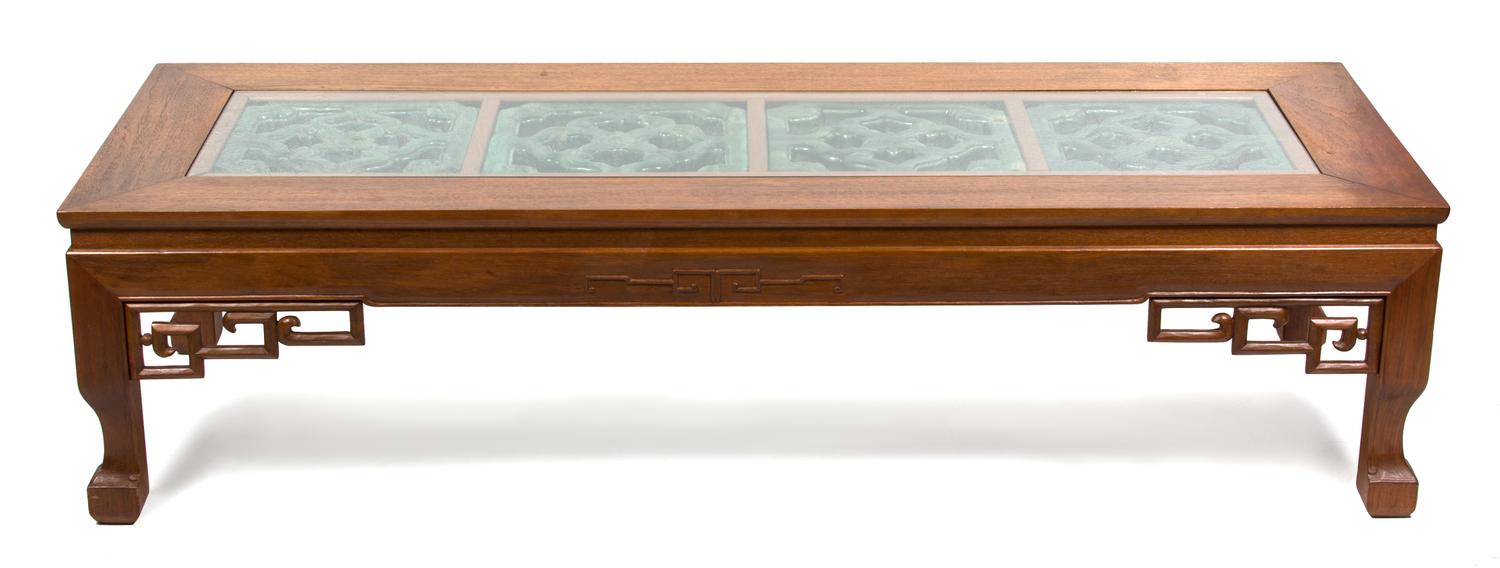 A Chinese Carved Teak Coffee Table Height 16 x width 63 3/4 x depth 23 1/2 inches. — 20TH CENTURY