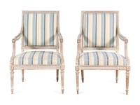 A Pair of Louis XVI Style Cream-Painted Fauteuils