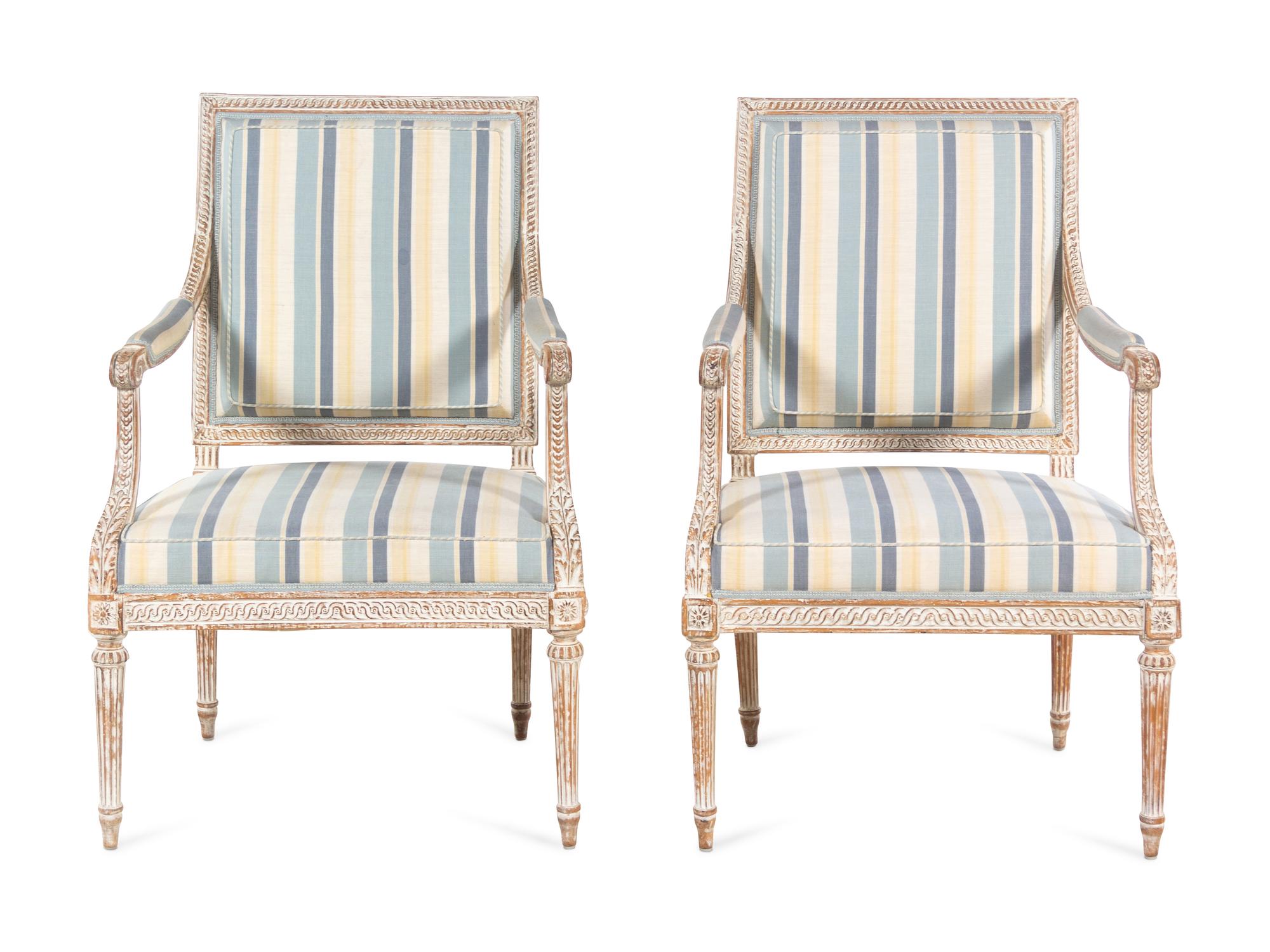 A Pair of Louis XVI Style Cream-Painted Fauteuils