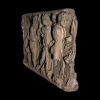 A Roman Marble Sarcophagus Fragment with a Dionysian Scene
