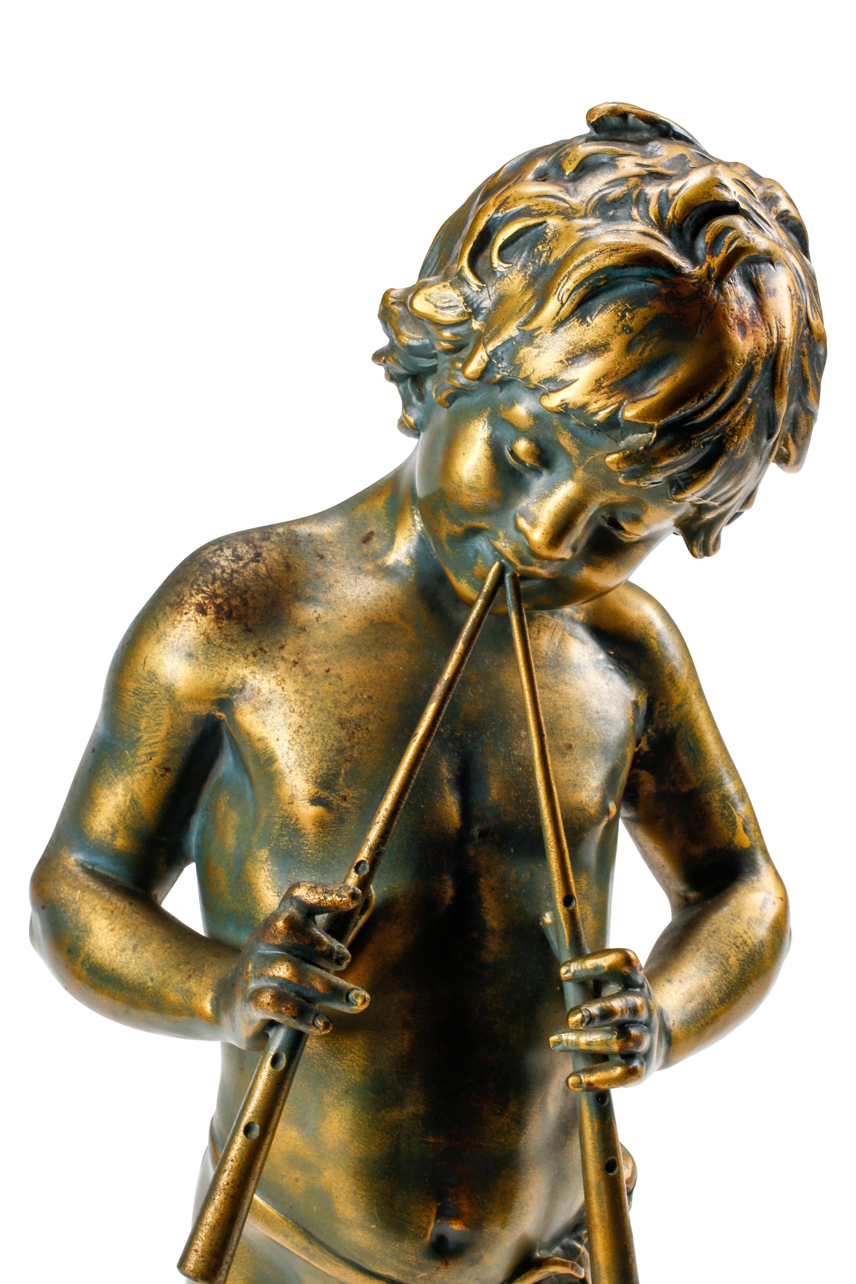 A French Gilt Metal Figure of a Flute Player