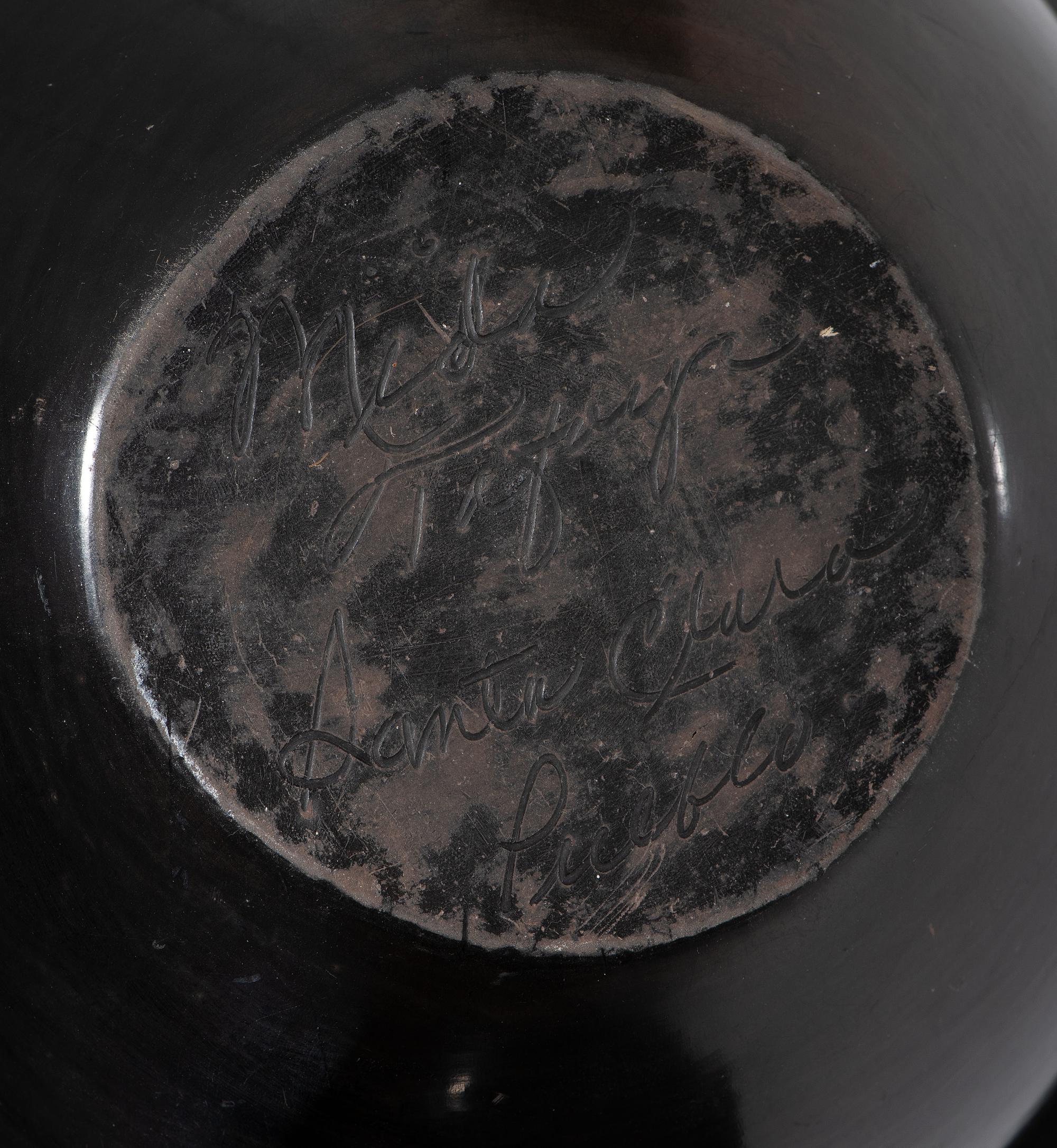 Pair of Carved Blackware Pottery Vases