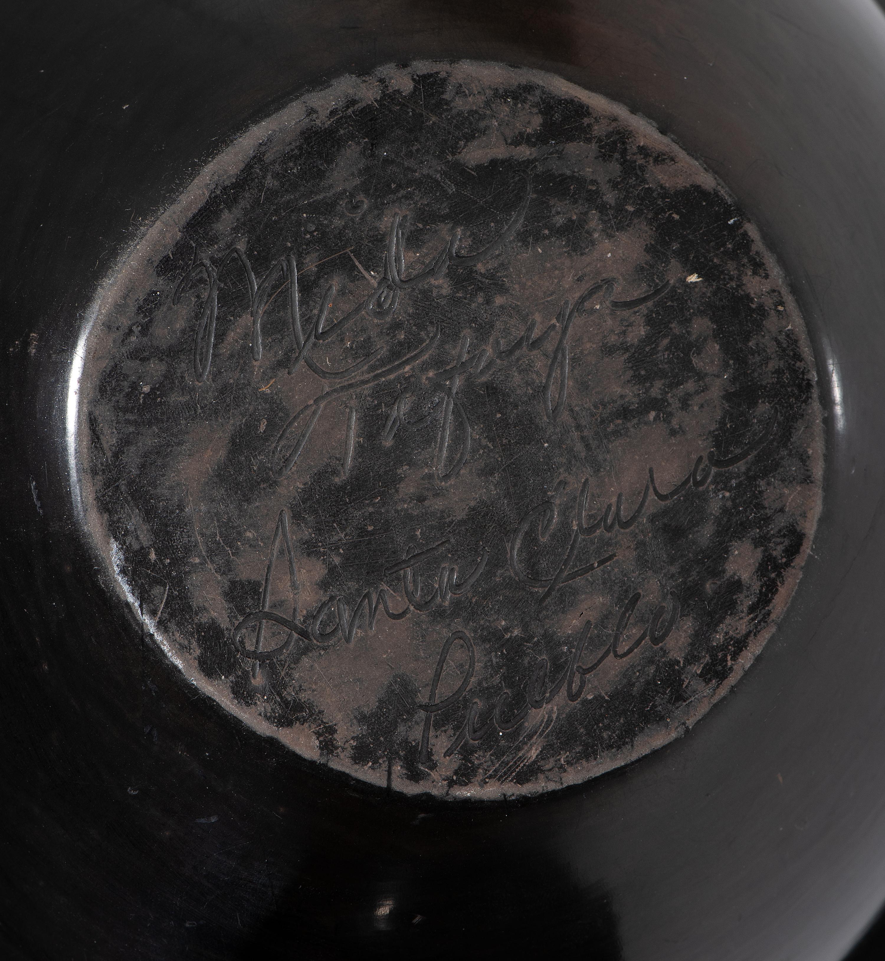 Pair of Carved Blackware Pottery Vases
