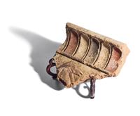 An Etruscan Painted Terracotta Relief Fragment