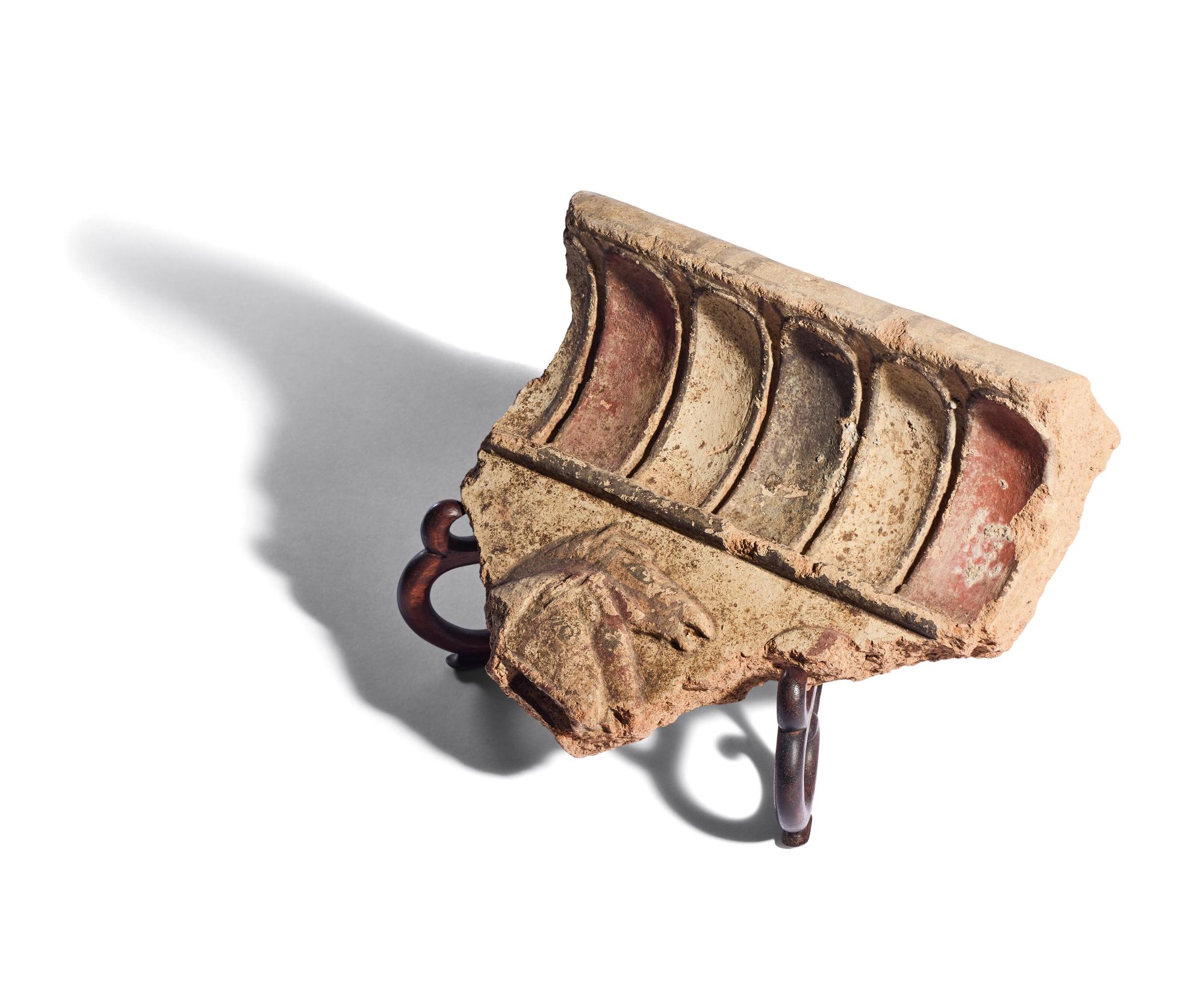 An Etruscan Painted Terracotta Relief Fragment