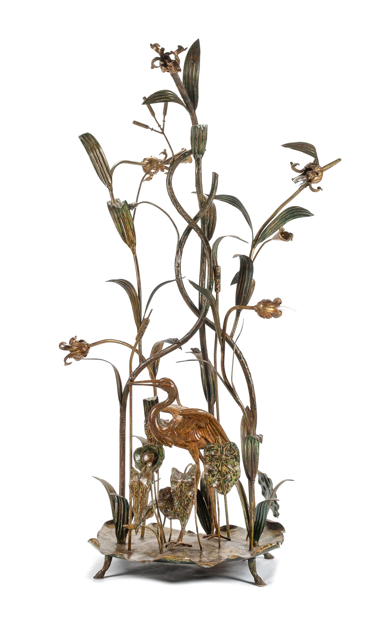 A Patinated Bronze Floor Lamp Height 74 inches.