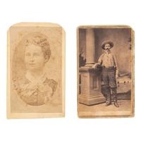 [EARLY PHOTOGRAPHY] -- [COWBOYS]. A group of 2 CDVs, incl. inscribed portrait of armed cowboy and portrait of his companion.