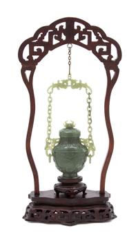 A Chinese Spinach Jade Covered Vase Height of jade 5 (overall 15) inches. — 20TH CENTURY