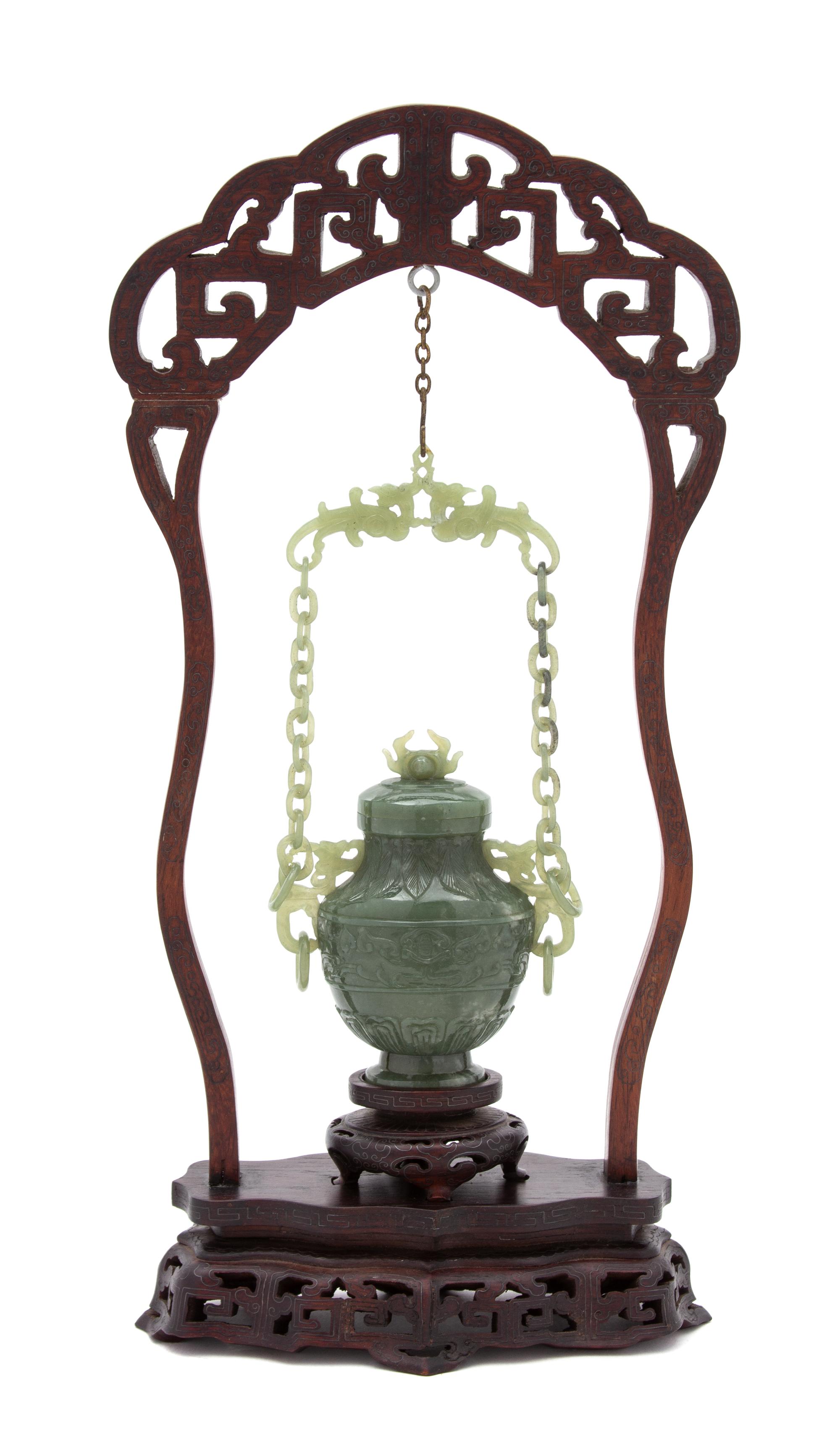 A Chinese Spinach Jade Covered Vase Height of jade 5 (overall 15) inches. — 20TH CENTURY